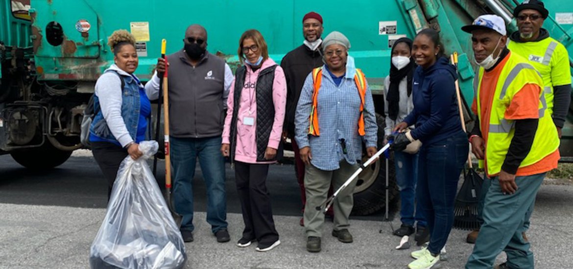 Mayor's Office of Neighborhoods staff collecting trash